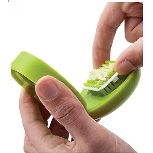 Effortless Mini Garlic Chopper & Press – Manual Mincer with Storage Container, Durable Stainless Steel Blades, Ergonomic Grip in Vibrant Green
